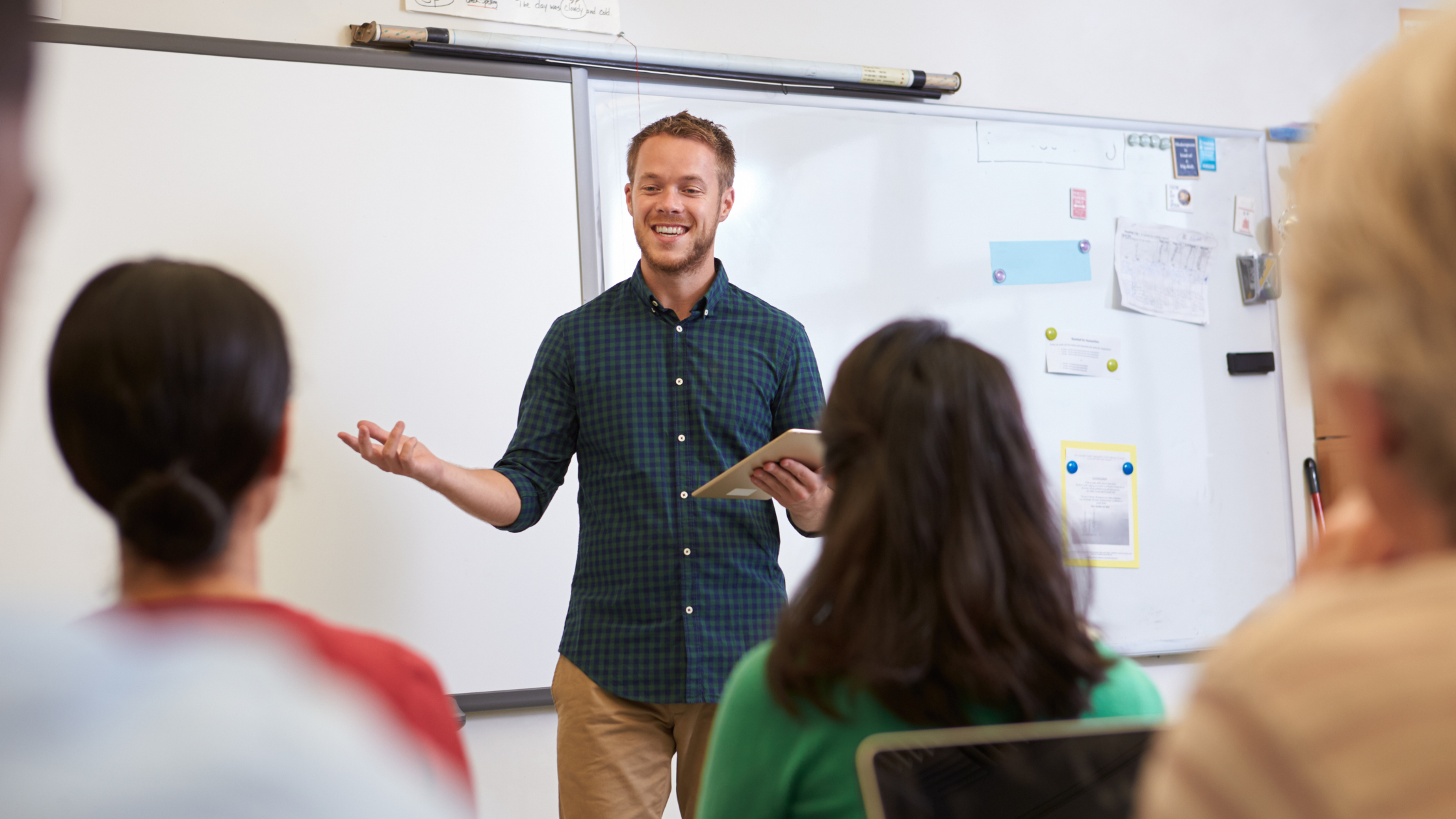 Teacher presenting to a classroom